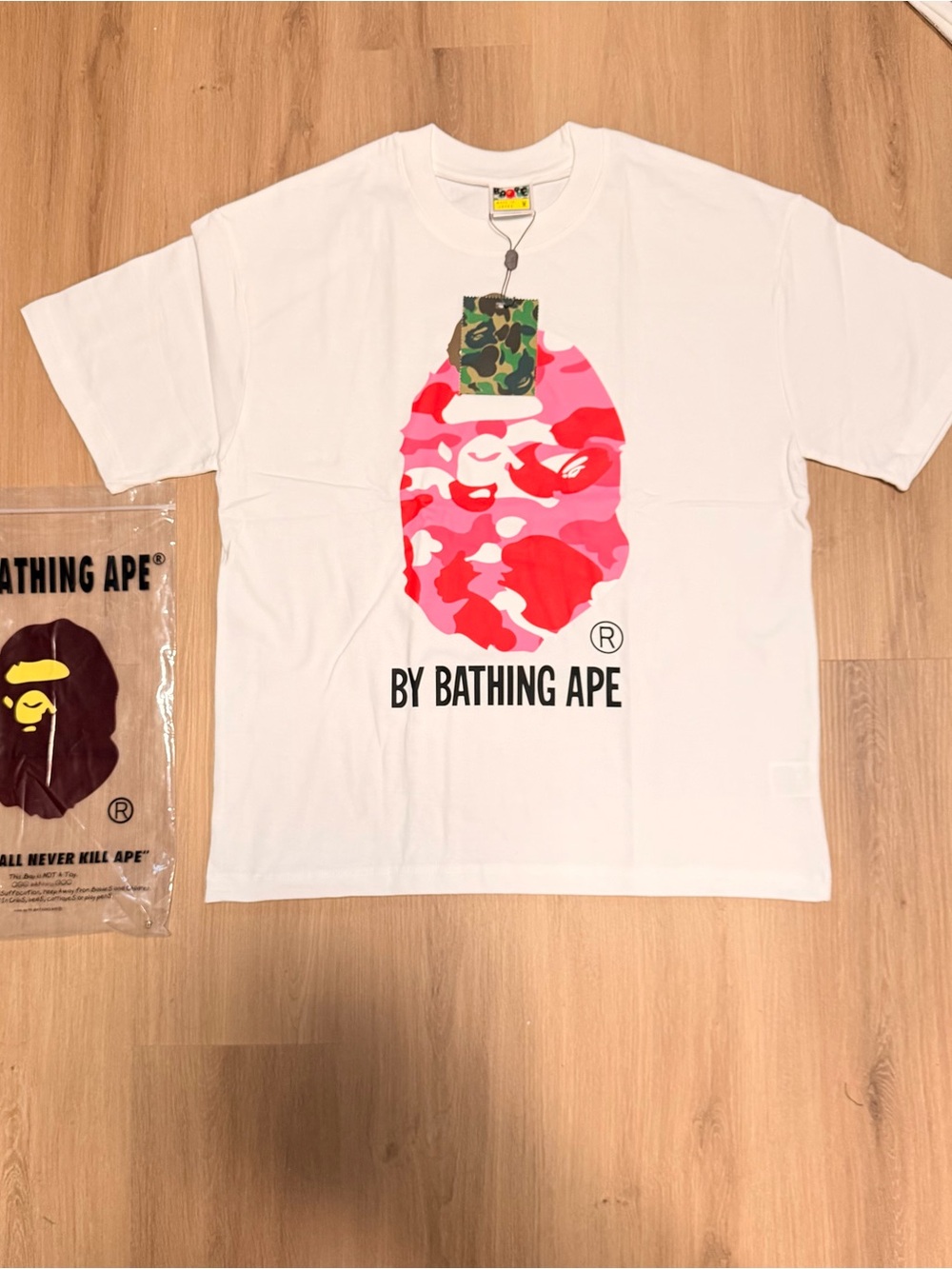 A Bathing Ape White Short Sleeve Tee with Pink Camo Ape Head